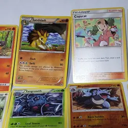 Lot of 29 Pokemon Cards & Mini Binder Kindra EX Wishiwashi GX Plus 27 others - Image 4