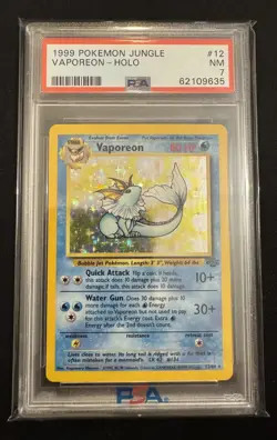 1999 POKEMON JUNGLE #12 VAPOREON-HOLO PSA 7 - Image 1