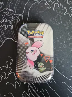 Pokemon TCG: Unova Mini Tin - Alomomola & Axew - Black Bolt & White Flare - Image 1