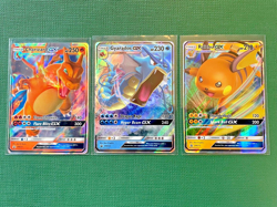 POKEMON 2019 CHARIZARD GYARADOS RAICHU GX - TIN PROMOS HIDDEN FATES - ENGLISH - Image 1