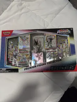 Pokemon TCG Scarlet and Violet Prismatic Evolutions Premium Figure Collection. - Image 1