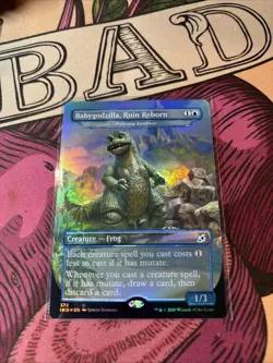 Babygodzilla Ruin Reborn Pollywog Symbiote Foil Near Mint, English Edition - Image 1