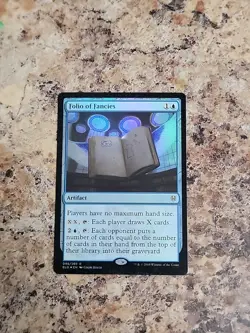 Folio of Fancies FOIL Throne of Eldraine NM Artifact Blue Rare MTG Never Played - Image 1