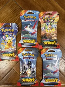 Pokemon Surging Sparks Sleeved Booster Packs - Factory Sealed Lot Of 5 Packs - Image 1