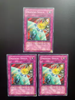 Yugioh Draining Shield DP1-EN026 Common 1st Edition MP/HP X3 - Image 1
