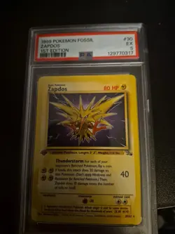 1999 POKEMON FOSSIL #30 ZAPDOS 1ST EDITION PSA 5 - Image 1