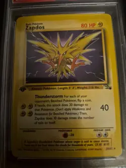 1999 POKEMON FOSSIL #30 ZAPDOS 1ST EDITION PSA 5 - Image 2