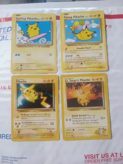 Lot Of 4 Pikachu Lt, Surge’s, WB MOVIE PROMO FLYING SURFING Pikachu Cards - Image 1
