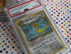 PSA 7 Dark Dragonite #149 Holo from 1997 Team Rocket Gang Japanese Pokemon TCG - Image 1