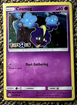COSMOG 64/149 HOLO TOYS R US PROMO POKEMON CARD NM - Image 1