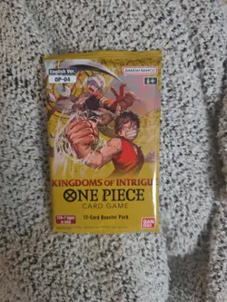 One Piece KINGDOMS OF INTRIGUE English Booster OP-04 Sealed 12-Card Pack - Image 1