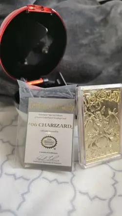 Rare 1999 Pokemon Charizard 23K gold-plated card with COA in Pokeball Case. - Image 1