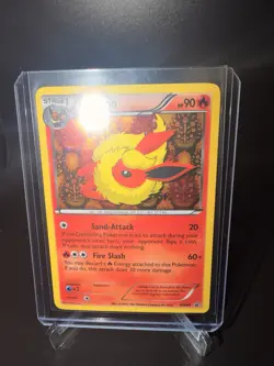 Pokemon Black And White Flareon BW88 Black Star Promo With Holo Swirl LP - Image 1
