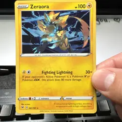 Pokemon Zeraora 061/185 Vivid Voltage Cosmos Holo Rare NM swirl 💫🌀 - Image 1