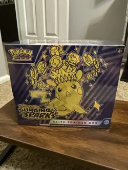 Surging Sparks ETB Factory Sealed Pokemon Cards - Image 1