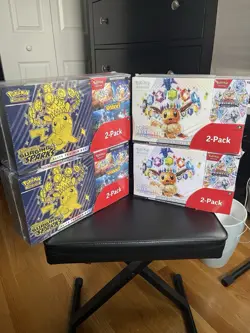 Pokemon Scarlet & Violet Prismatic Evolutions and Surging Sparks Costco Bundles - Image 1