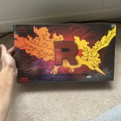 Pokemon TCG Team Rocket’s Moltres EX UPC Sealed In Hand - Image 1