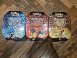 Set of 3 Pokemon Hidden Fates Tins - Charizard, Gyarados, and Raichu - Sealed - Image 1