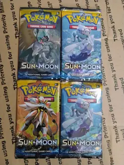 Pokemon TCG Sun and Moon Base Set Booster Pack Lot (4 Packs) - Image 2