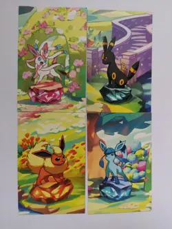 Pokemon 2025 Prismatic Evolutions Mini Tin Promo Art Card Bundle X4 - Image 1