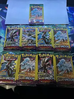 Lot of 9 Pokemon TGC Sun And Moon Guardians Rising 3 Card Booster Packs. - Image 1