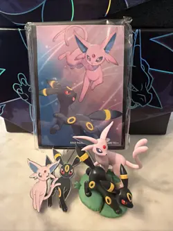 Prismatic Evolutions Figure Collection Card Sleeves, Figure And Pin - Image 1