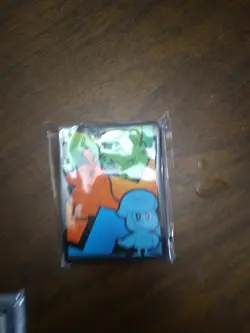 Pokemon Binder With Sleve's And 2 Coins And A Graded 10 Card. - Image 2