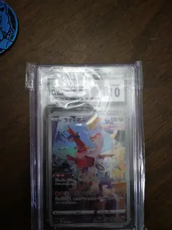Pokemon Binder With Sleve's And 2 Coins And A Graded 10 Card. - Image 4