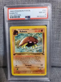 1st Edition 1999 Pokemon Fossil Kabuto PSA grade 8 - Image 1