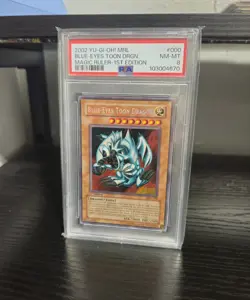 2002 Yu-Gi-Oh! Blue-Eyes Toon Dragon Magic Ruler MRL 1st Edition Secret PSA 8 - Image 1