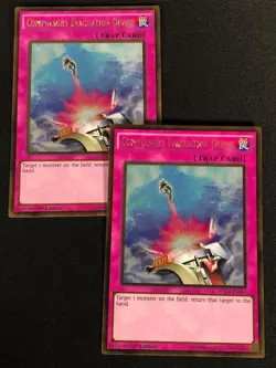 Yugioh Compulsory Evacuation Device PGL2-EN065 1ST GOLD X2 (NM) - Image 1