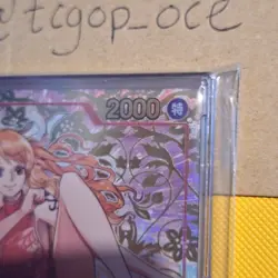 Chinese 1st Anniversary Red Serial Nami OP01-016 Authenticated One Piece Card - Image 3