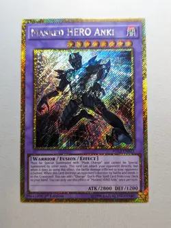 YuGiOh Masked HERO Anki Gold Secret Rare 1st Edition PGL2-EN011 LP - Image 1