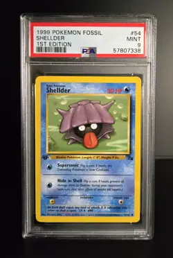 Pokemon TCG - SHELLDER - 1ST EDITION - 54/62 - FOSSIL (1999) - WOTC - PSA 9 MINT - Image 1