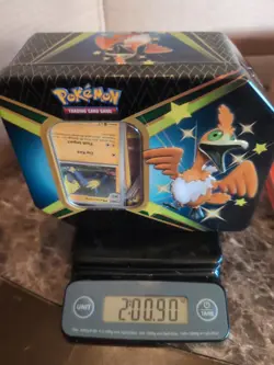 Over 2 LBs Of Pokemon Cards In Collector Cramorant Tin Surprise Lot - Image 1