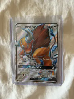 Tauros GX 144/149 Full Art Holo Ultra Rare Sun & Moon Base Set Pokemon Card NM - Image 1