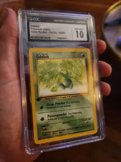 CGC 10 GEM MINT Oddish 1st Edition 63/82 Team Rocket Pokemon Card - Image 1