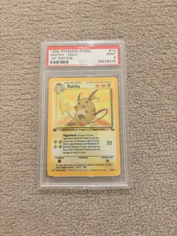 Pokemon PSA 9 Raichu Holo 1999 14/62 Fossil 1ST Edition - Image 1