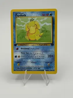 PSYDUCK - 65/82 1st Edition Team Rocket WOTC Vintage TCG Pokemon Card NM - MT - Image 1