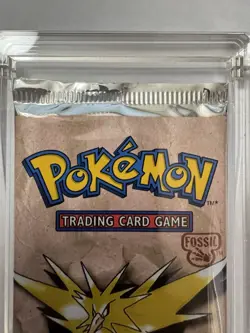 Pokemon 1st Ed FOSSIL 11-Card Booster Pack--Factory Sealed--Plus acrylic case 742818060714 - Image 4