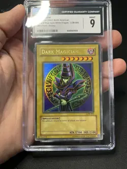 2002 Yugioh Dark Magician LOB-005 Ultra-Rare Unlimited Original 1.5 Print - Image 1