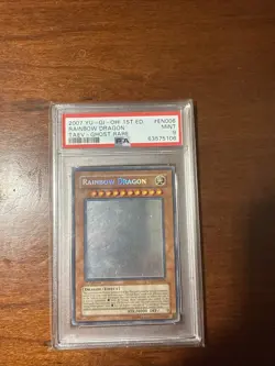 YuGiOh Rainbow Dragon (Ghost Rare) TAEV-EN006 Tactical Evolution 1st Ed PSA 9 - Image 1