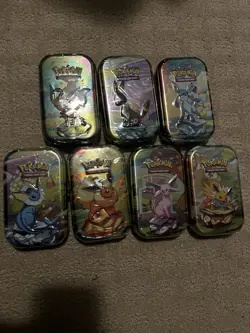 Pokemon TCG Scarlet & Violet Prismatic Evolutions Mini Tins x7 - Image 1