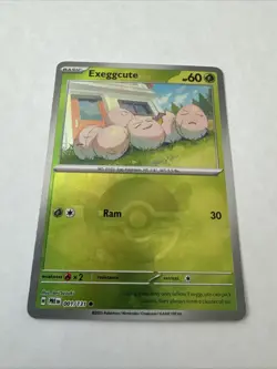 Pokemon Exeggcute 001/131 Pokeball Pattern Holo Prismatic Evolutions NM 2025 - Image 1