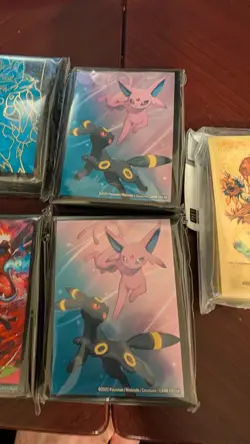 Pokemon TCG ETB Card Sleeves - Lot of 7 Sealed. Van Gogh, Umbreon , Ect - Image 4
