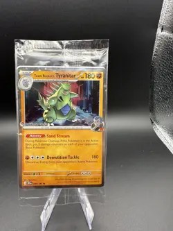 Team Rocket’s Tyranitar 096/182 - Pokemon Center Exclusive Promo - Sealed - Image 1