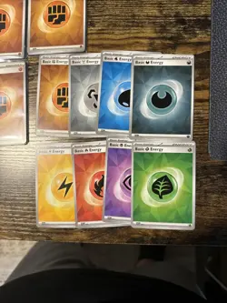 POKEMON S&V Surging Sparks NM COMPLETE SET 2023 Com Basic ENERGY CARDS -Lot of 8 - Image 1