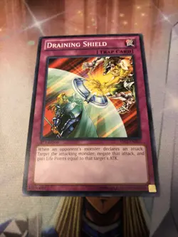Draining Shield - YS12-EN035 - Common - 1st Edition x1 - Lightly Played - Image 1