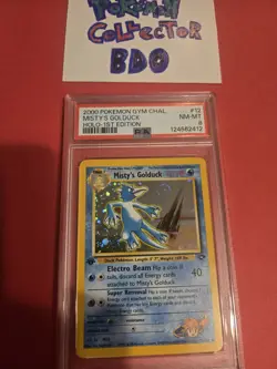 Misty's Golduck 1st Edition Holo Gym Pokemon Card WOTC PSA 8 - Image 1