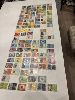 113 Card Lot Of Random Pokemon cards in sheets Found In a Storage Unit - Rare - Image 1